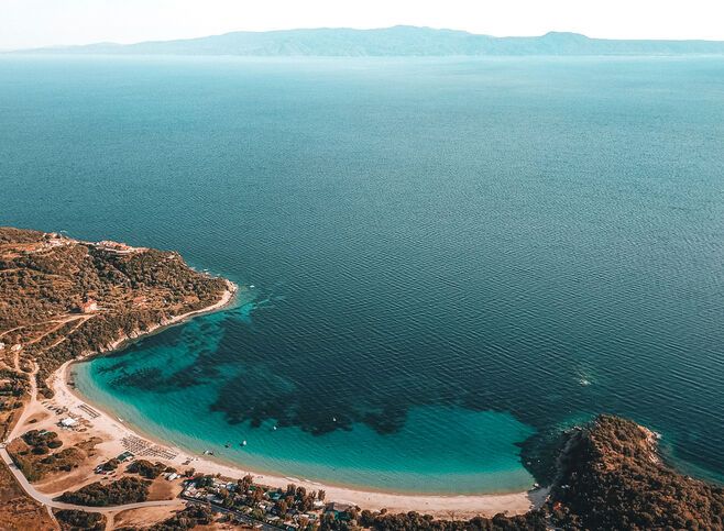 Alikes, one of most beautiful and popular beaches on the island, looking onto the Sithonia peninsula