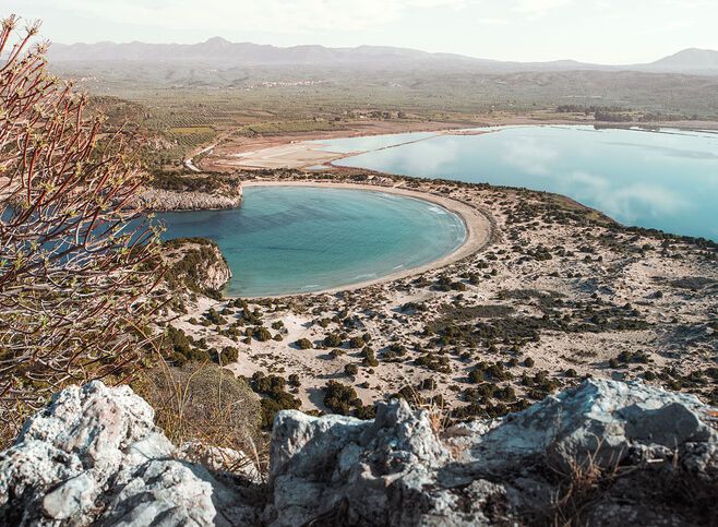 Voidokilia, the majesty of nature quite like the iconic horseshoe-shaped beach and its accompanying saltwater lagoon in Messinia