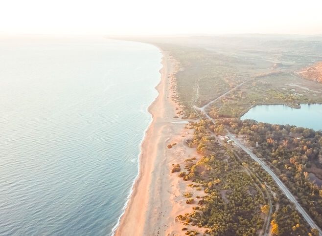 A narrow strip of land separates the sea from the Lagoon of Kaïafas