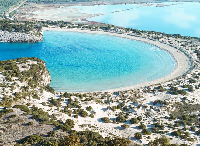 From ground level, the scene is scarcely less impressive than the iconic horseshoe-shaped image of the beach photographed from above