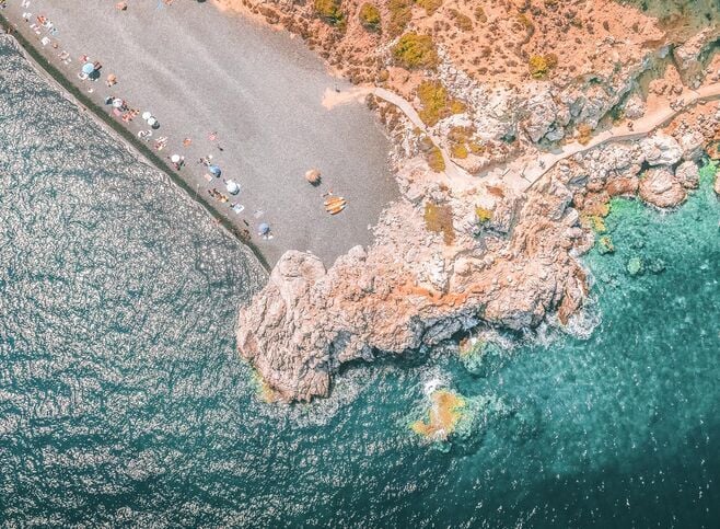 The famous beach of Mavra Volia-Black Pebbles