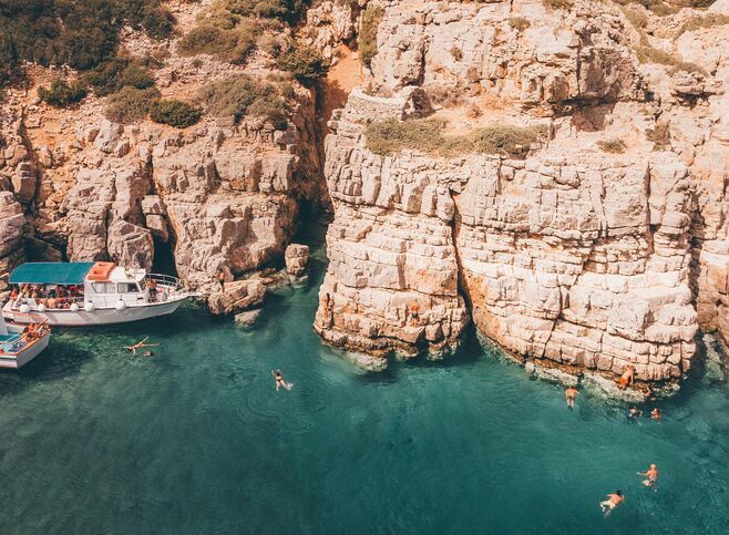 Boat trips to the island of Saria, an island of wild beauty, listed as a Natura 2000 area