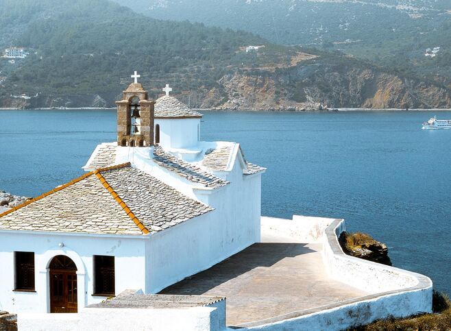 Church overlooking Skopelos bay