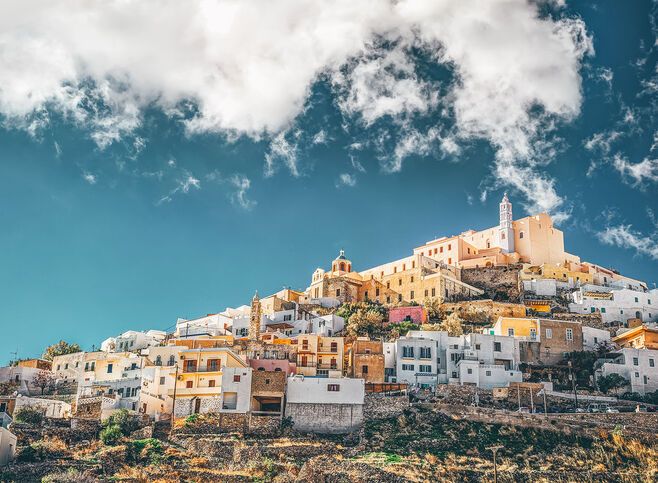 To meander through the cobblestone streets of Upper Syros (as the name translates) is to uncover the medieval and Catholic character