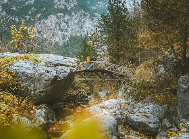 Wooden bridges criss-cross the 10km Epineas path along the densely-forested valley
