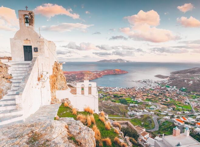 From the beautiful chapel of Agios Konstantinos nearby, you can look out beyond Livadi onto a who’s who of Cycladic islands