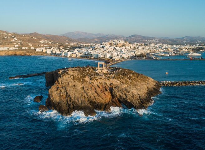 View of Naxos Hora from the little island on which Portara stands, Palatia, is now connected to the mainland