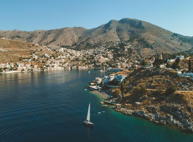 Arriving at Gialos, Symi’s main port imprints itself into your memory like a photograph.