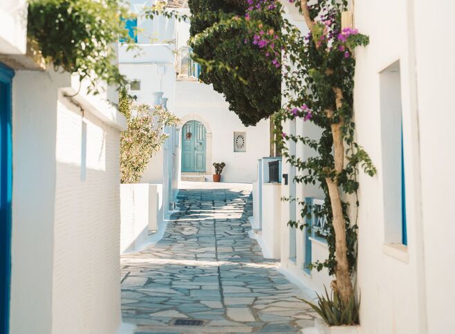 You’ll find plenty more examples of Tinos’ famed marblework in the windows and doors, as you wander the streets of Pyrgos