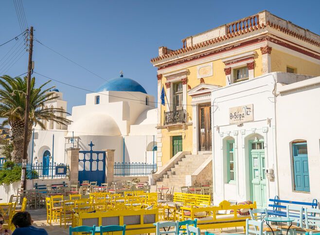 The strikingly coloured neoclassical Town Hall dominates the square
