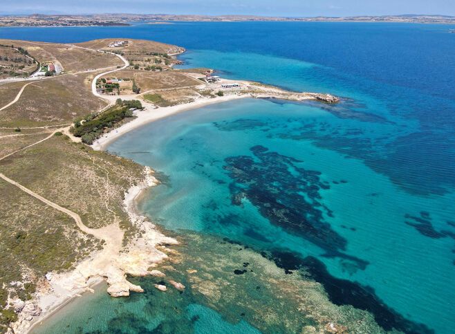 Fine white sand and shallow water greet you at Fanaraki beach in Lemnos
