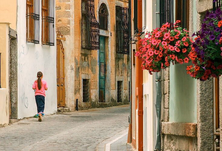 Xanthi's Old Town, multi-coloured homes have painted walls, wooden windows and blossom-filled  gardens