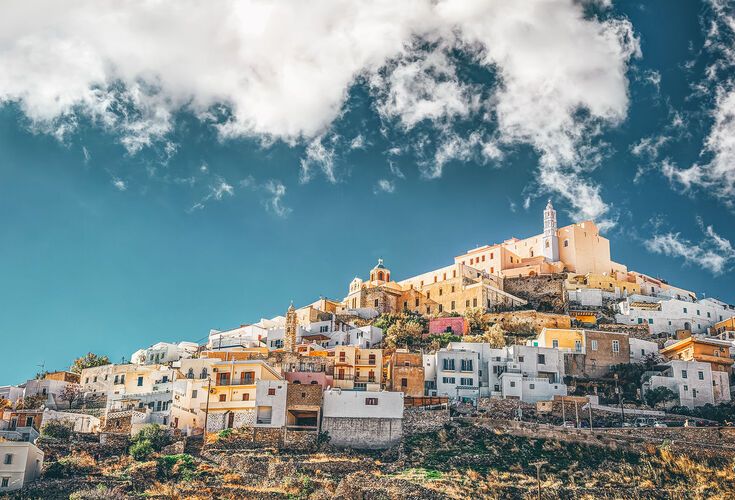 To meander through the cobblestone streets of Upper Syros (as the name translates) is to uncover the medieval and Catholic character