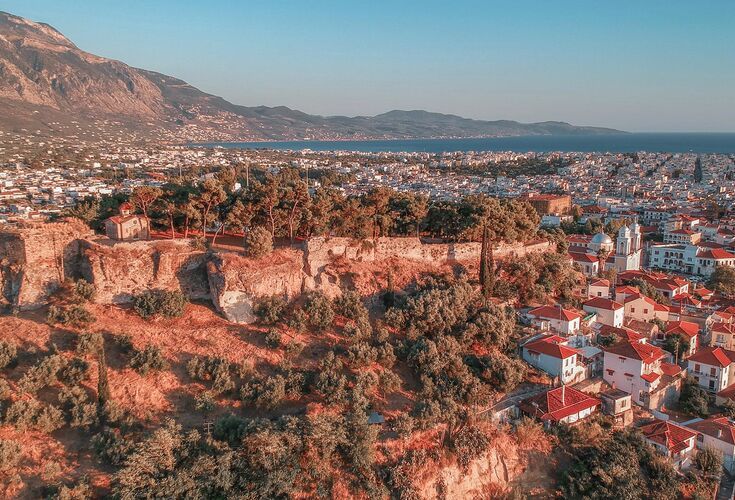 Aerial view of the wonderful old town of Kalamata City and the historical Castle at Sunset