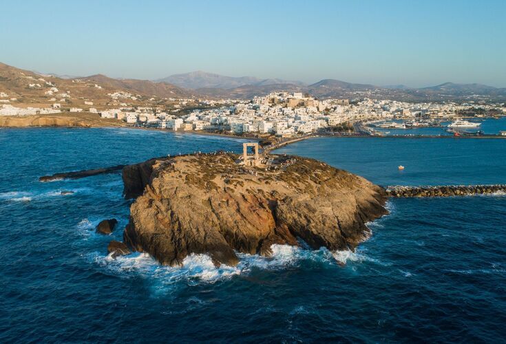 View of Naxos Hora from the little island on which Portara stands, Palatia, is now connected to the mainland