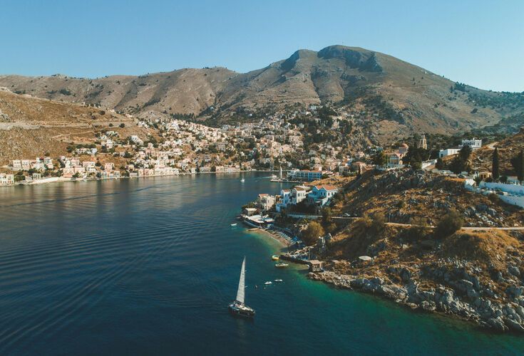 Arriving at Gialos, Symi’s main port imprints itself into your memory like a photograph.