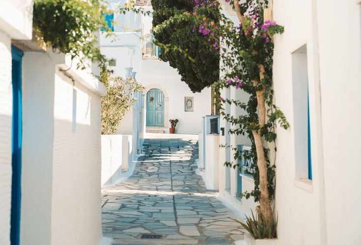 You’ll find plenty more examples of Tinos’ famed marblework in the windows and doors, as you wander the streets of Pyrgos