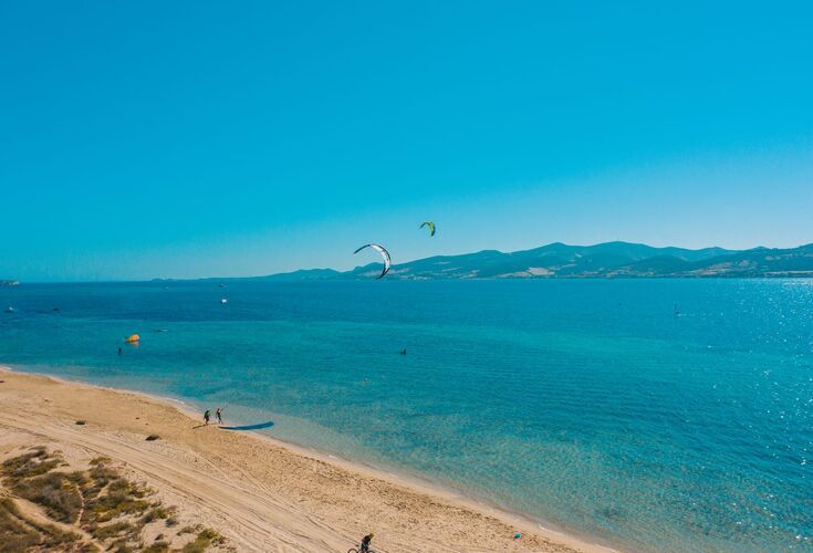 Pounda Kite beach located by a 1.5km channel between Paros and Antiparos which ensures a steady supply of strong winds