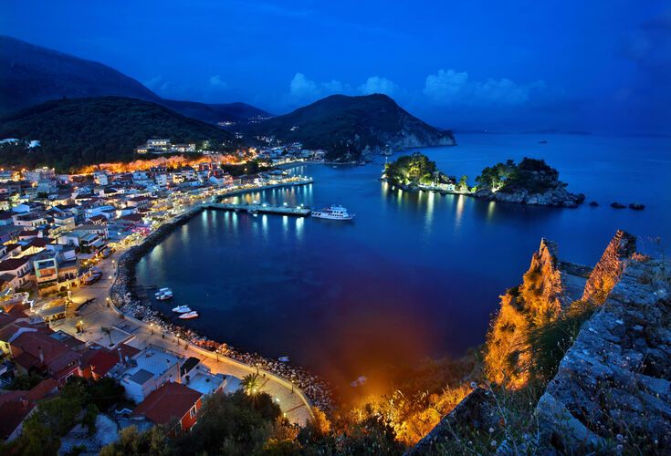 Panoramic night view of Parga town and the islet of Panagia
