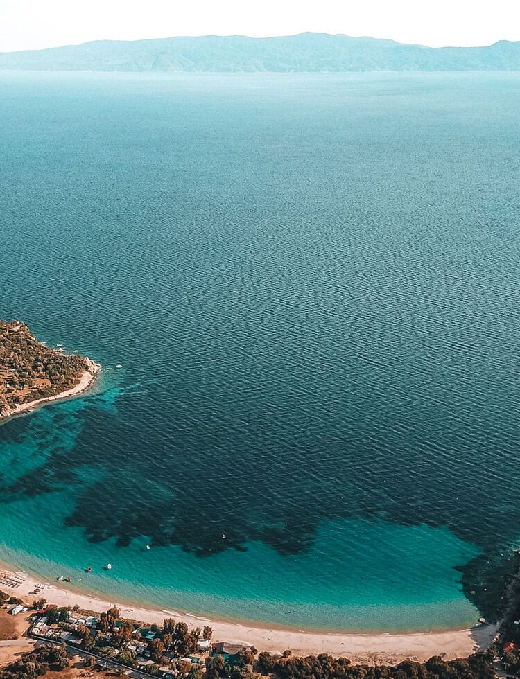 Alikes, one of most beautiful and popular beaches on the island, looking onto the Sithonia peninsula