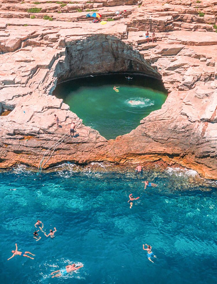 Giola lagoon the natural pool carved into the rock by the sea in Thassos