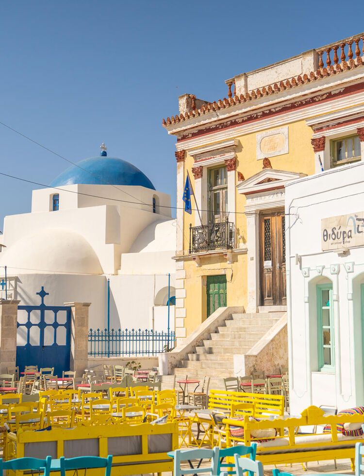 The strikingly coloured neoclassical Town Hall dominates the square