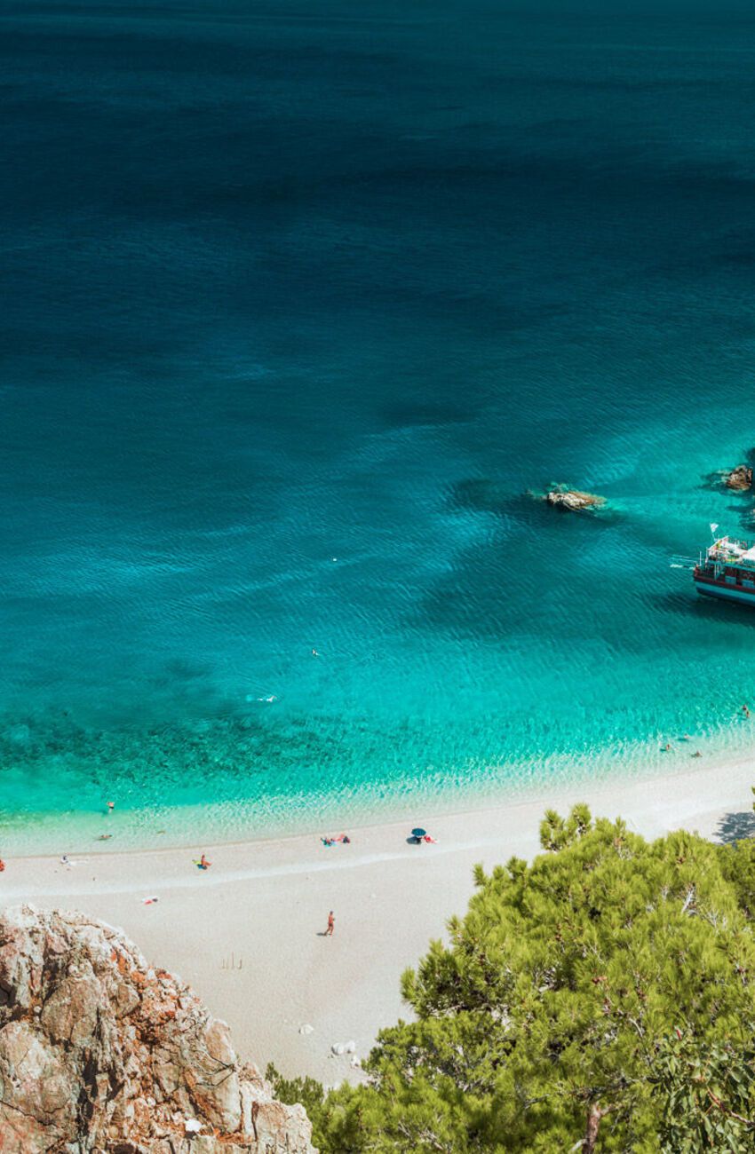 In a setting of pine-tree green, white sand and deep blue sea, Apella has a special knack of capturing the hearts of those who discover it