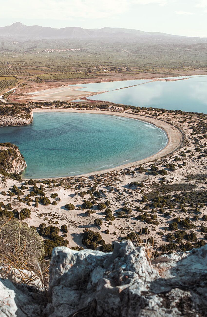 Voidokilia, the majesty of nature quite like the iconic horseshoe-shaped beach and its accompanying saltwater lagoon in Messinia