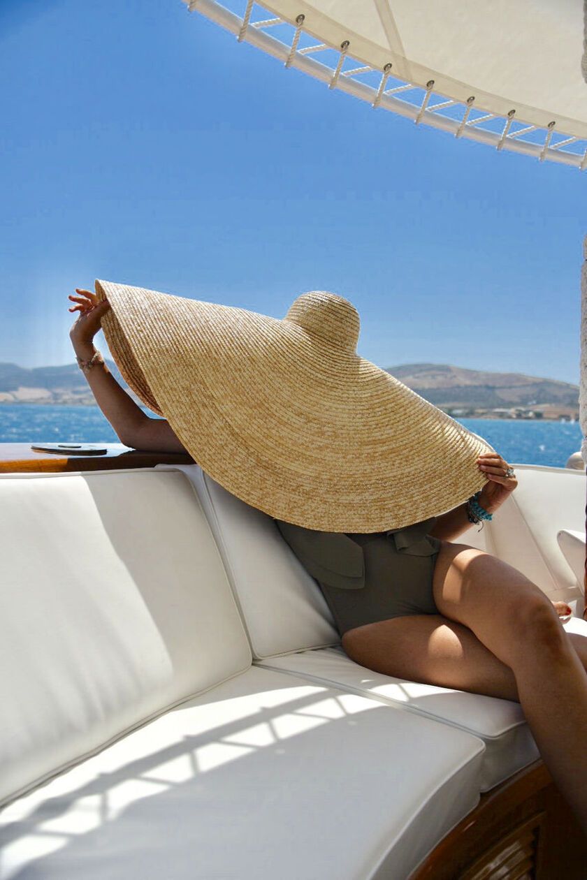 A large hat is needed to protect you from the strong Greek sun! 