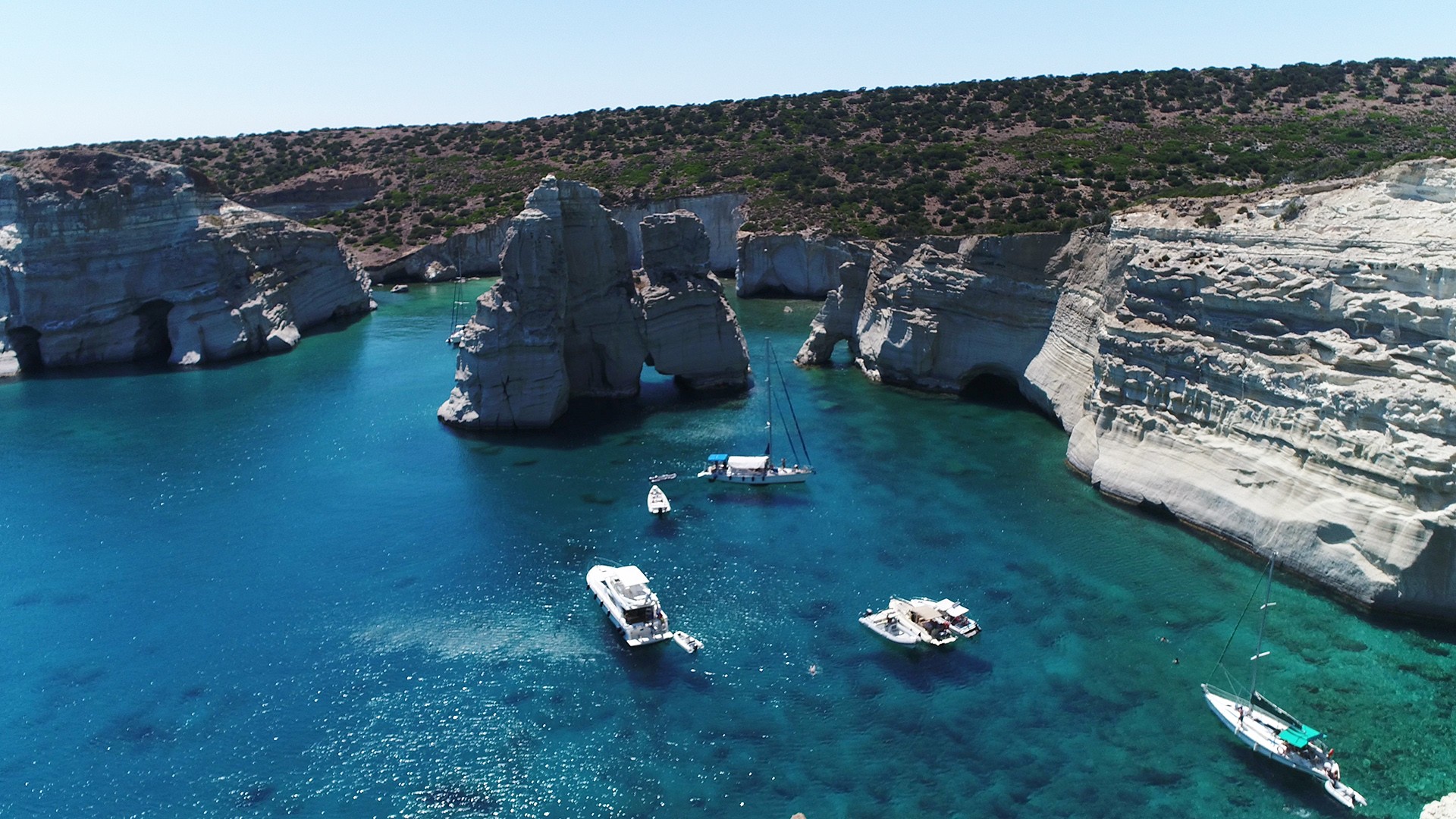 A full-day boat trip from Sifnos to truly spectacular Milos, with Kleftiko caves and Sarakiniko