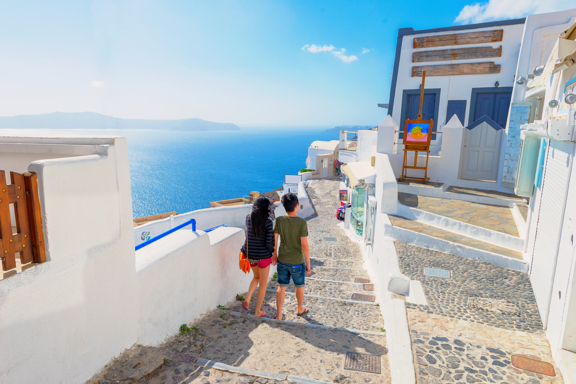 The famous island of Santorini in the Cyclades, panoramic view of traditional whitewashed houses and colorful caldera