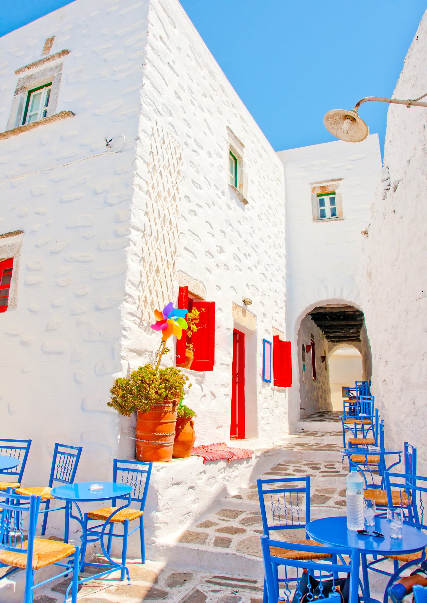 Tables and chairs in Chora the capital of Amorgos island